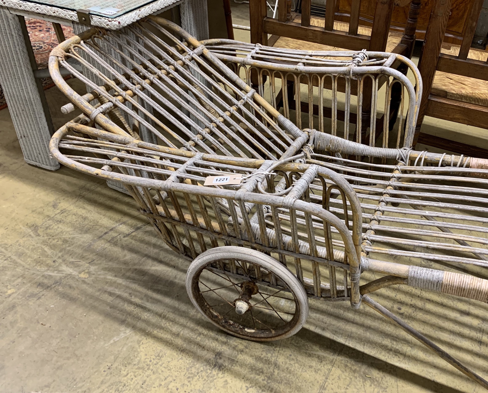 A vintage bamboo garden lounger, length 190cm, height 66cm
